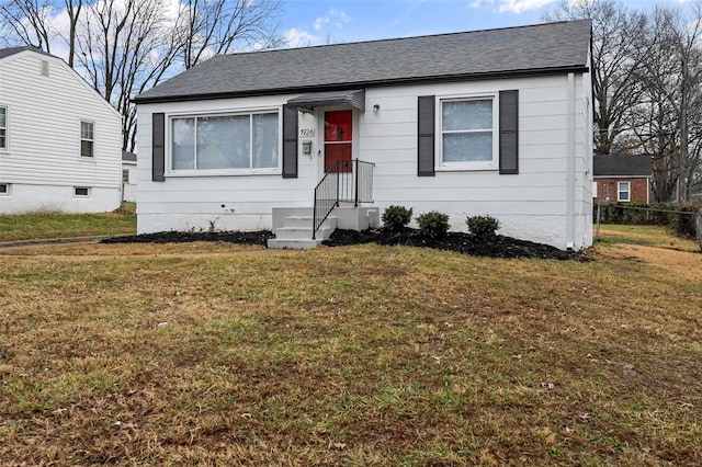 view of front of home featuring a front yard