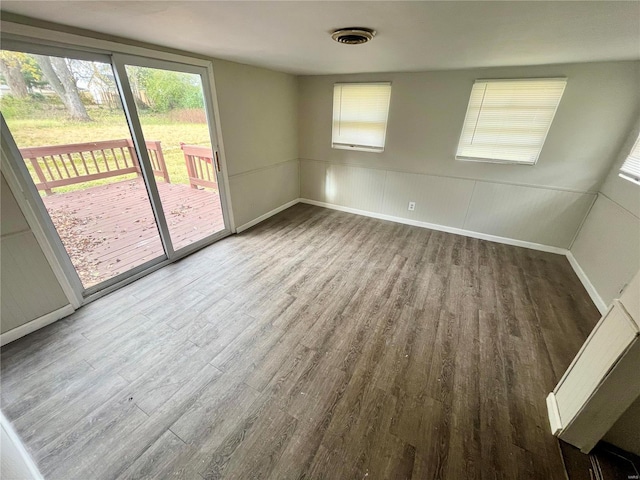 empty room featuring hardwood / wood-style floors