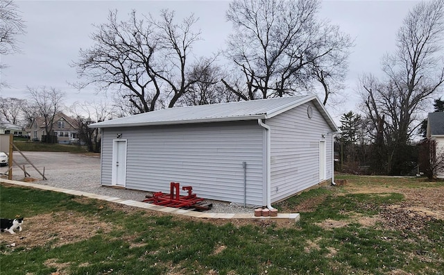 view of outdoor structure featuring a yard