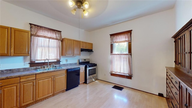 kitchen with ceiling fan, stainless steel gas stove, dishwasher, sink, and light hardwood / wood-style floors