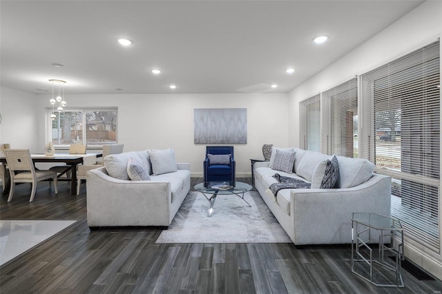 living room with dark hardwood / wood-style floors