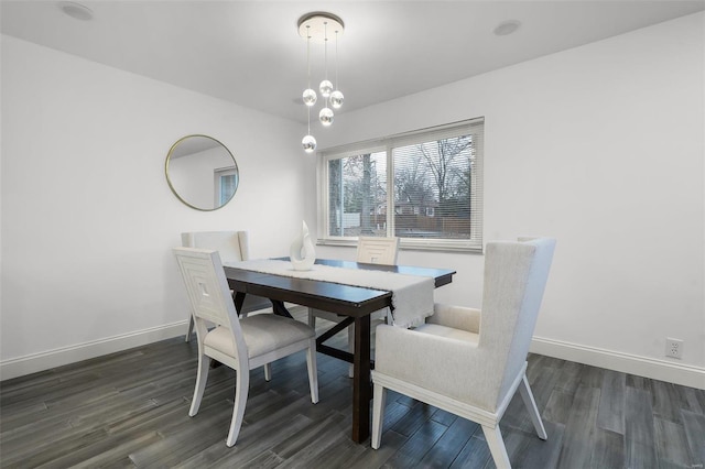 dining room with dark hardwood / wood-style floors