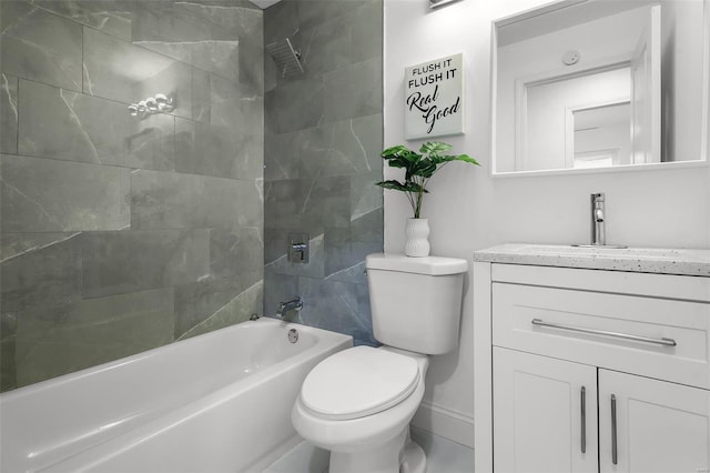 full bathroom with tiled shower / bath combo, toilet, and vanity