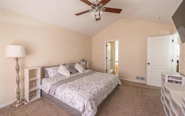 carpeted bedroom featuring connected bathroom, ceiling fan, and vaulted ceiling