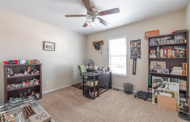 carpeted office with ceiling fan