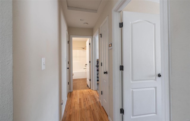 hallway featuring light wood-type flooring