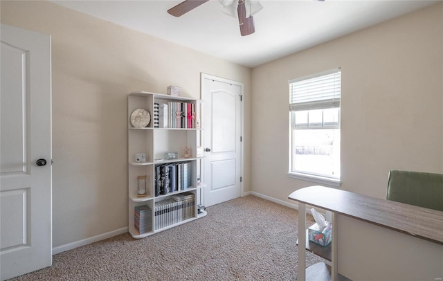 miscellaneous room featuring light colored carpet, plenty of natural light, and ceiling fan