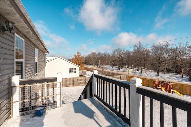 view of snow covered deck