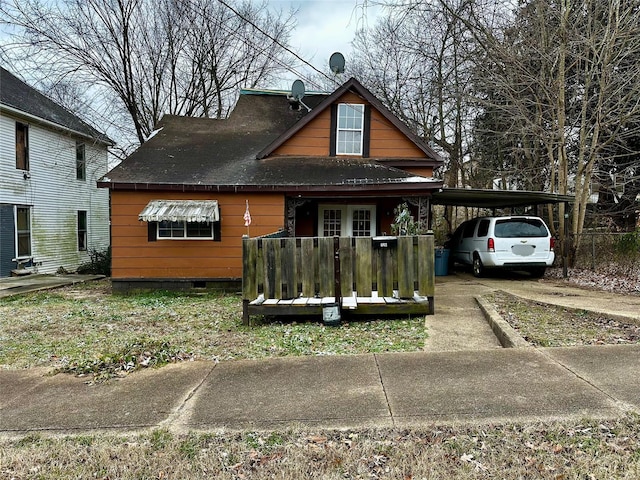 view of front of home featuring a carport