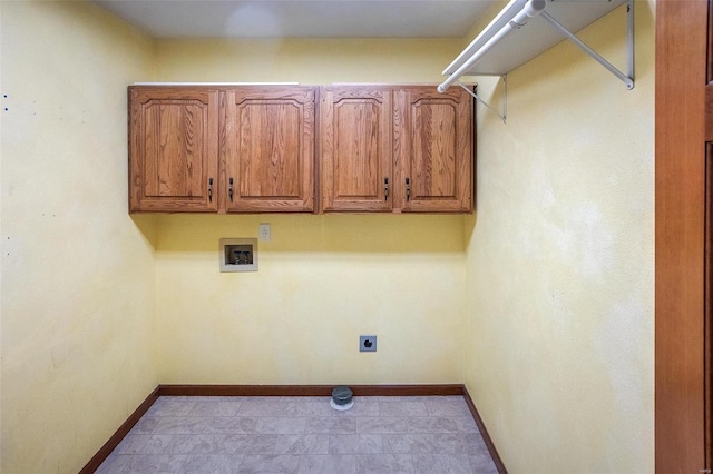 laundry room with hookup for a washing machine, hookup for an electric dryer, and cabinets