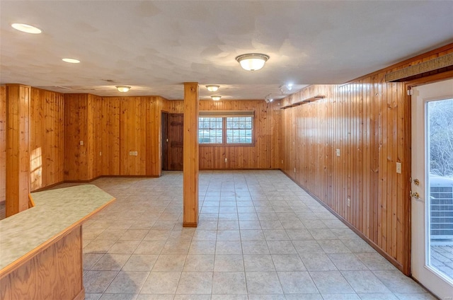 basement with wooden walls