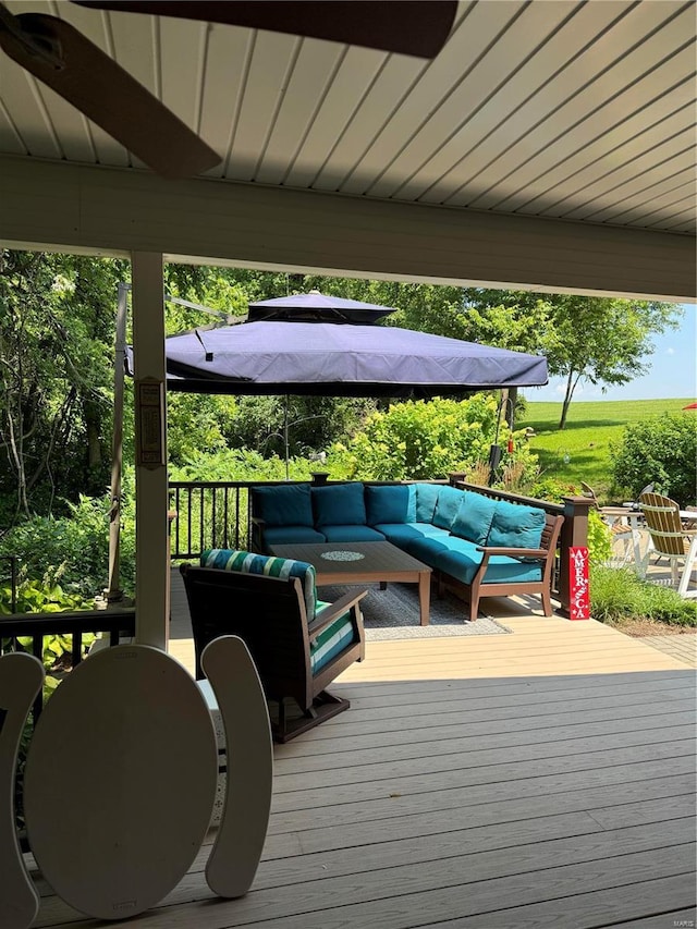 deck with an outdoor hangout area