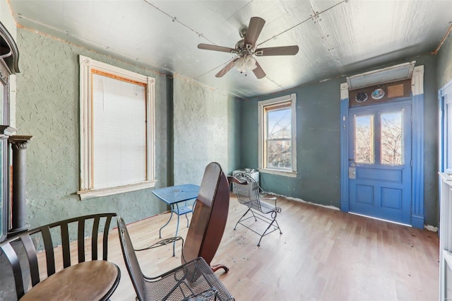 unfurnished room featuring ceiling fan and light hardwood / wood-style flooring