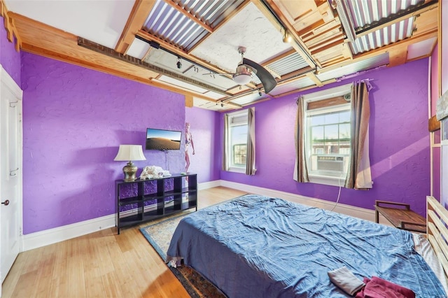 bedroom with light wood-type flooring