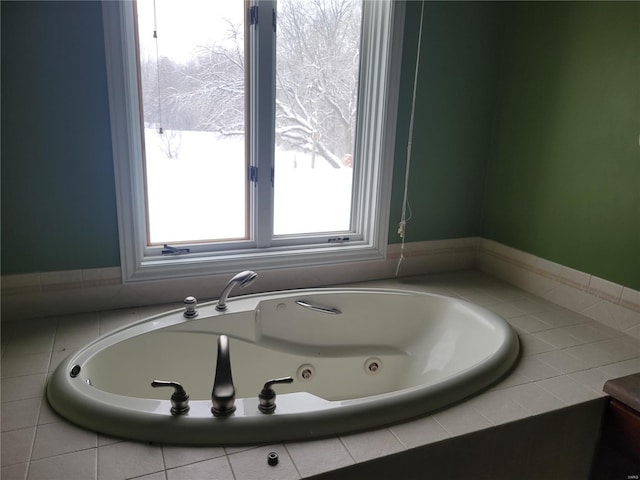 bathroom featuring tiled bath