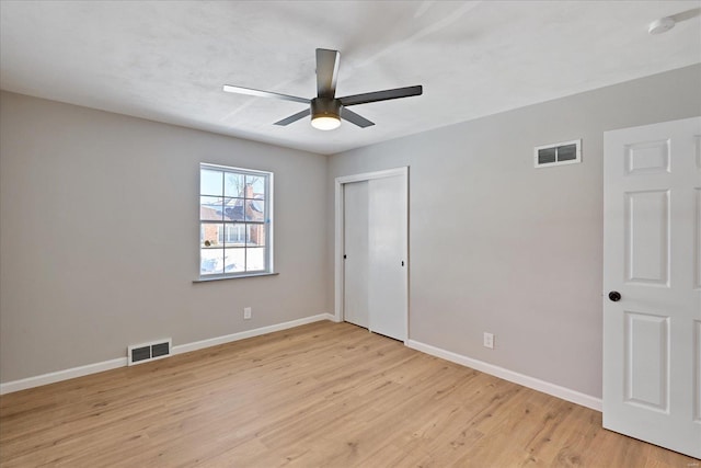 unfurnished room featuring ceiling fan and light hardwood / wood-style floors