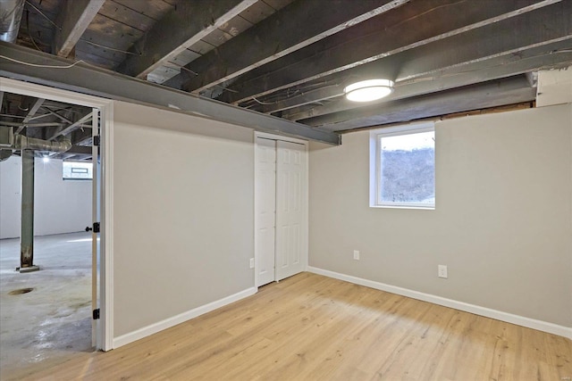 basement with wood-type flooring