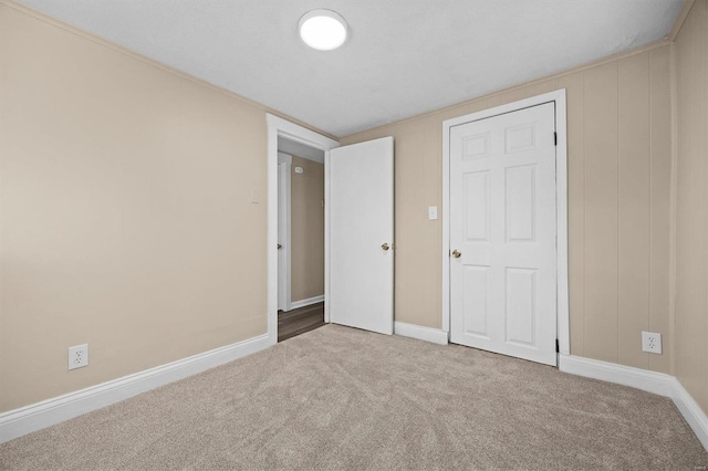 unfurnished bedroom featuring carpet flooring