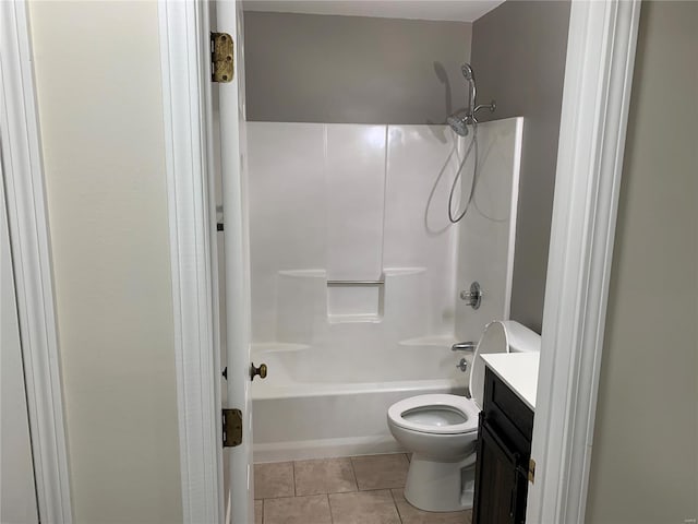 full bathroom with tile patterned floors, vanity,  shower combination, and toilet