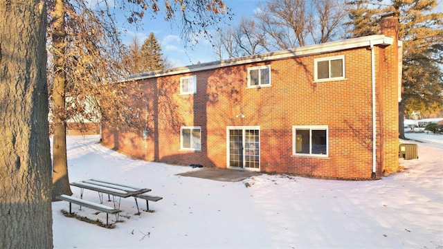 view of snow covered property