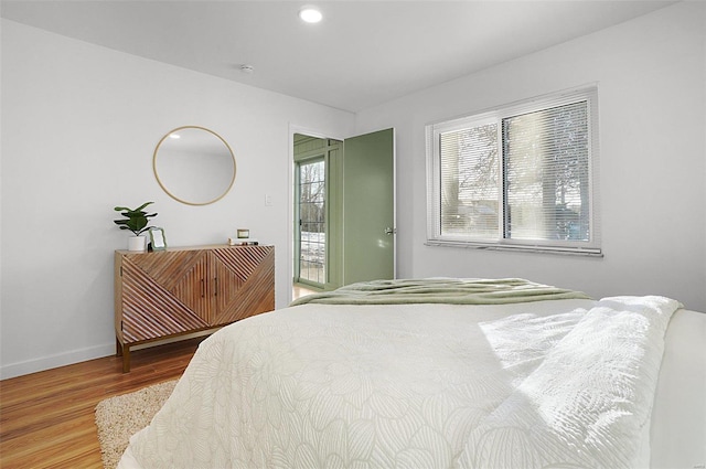 bedroom featuring wood-type flooring