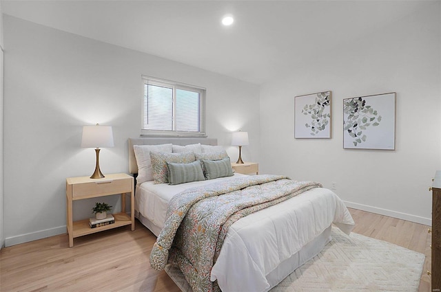 bedroom featuring light wood-type flooring