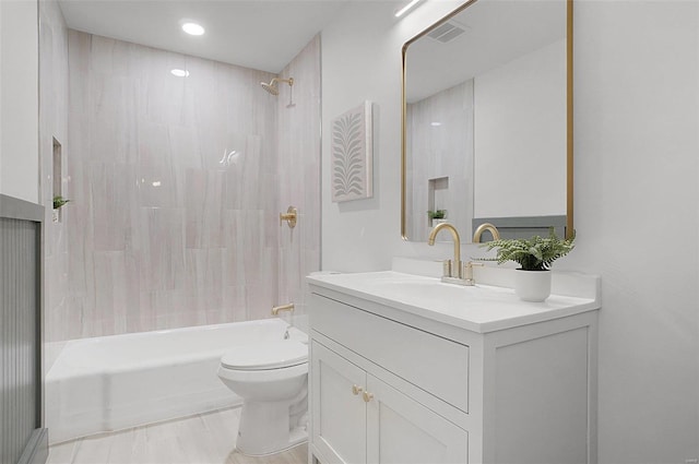 full bathroom with toilet, tub / shower combination, and vanity