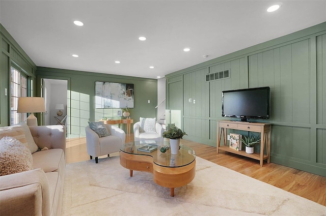 living room with wood-type flooring