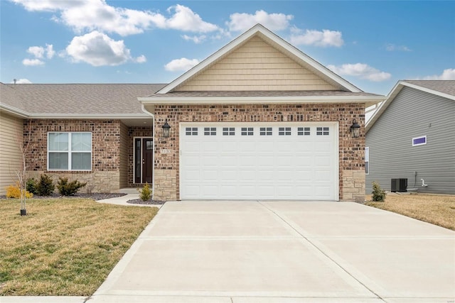 ranch-style house featuring a garage, brick siding, a front lawn, and a shingled roof