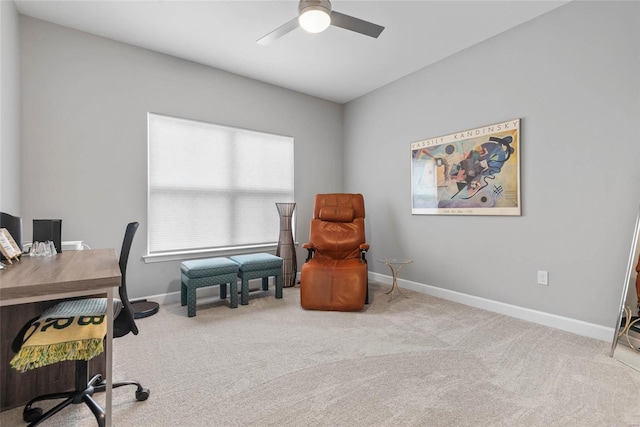 office featuring carpet flooring, ceiling fan, and baseboards