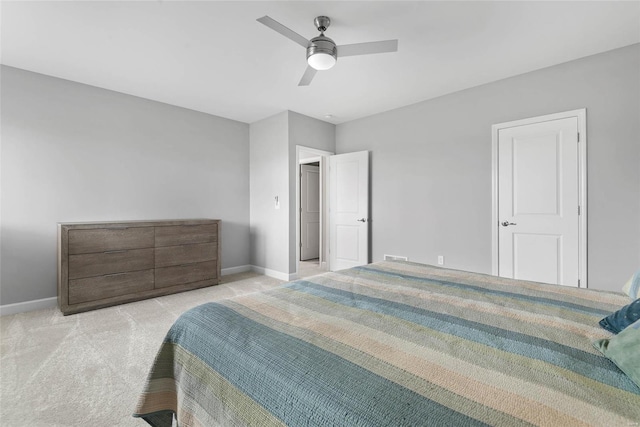 bedroom with baseboards, carpet, and ceiling fan