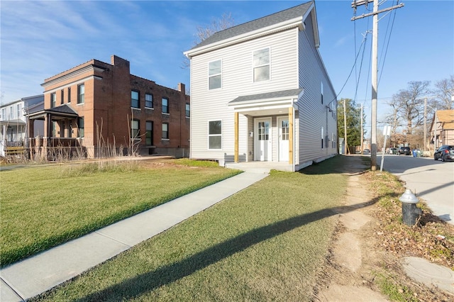 view of front of house featuring a front lawn