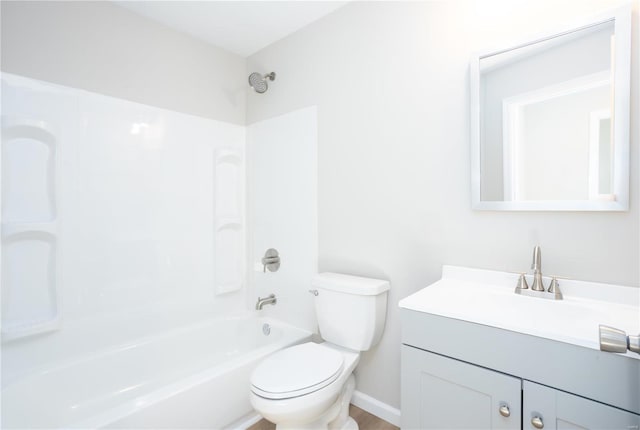 full bathroom featuring shower / washtub combination, vanity, and toilet