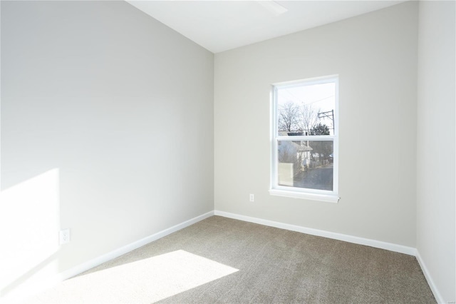 empty room featuring carpet flooring