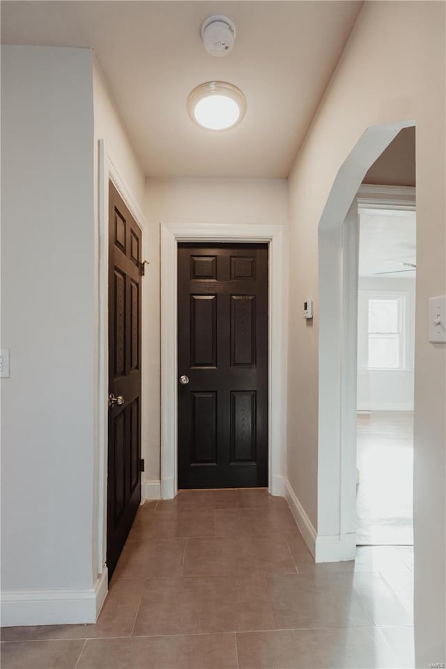 interior space with light tile patterned floors