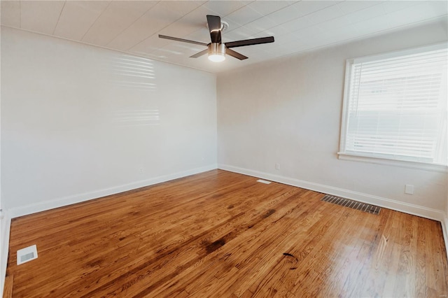 unfurnished room featuring hardwood / wood-style flooring and ceiling fan