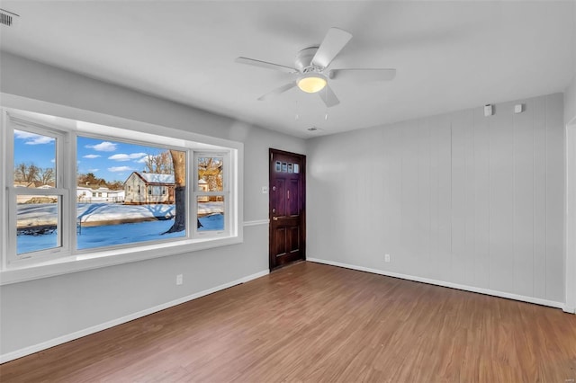 entrance foyer featuring ceiling fan and wood-type flooring