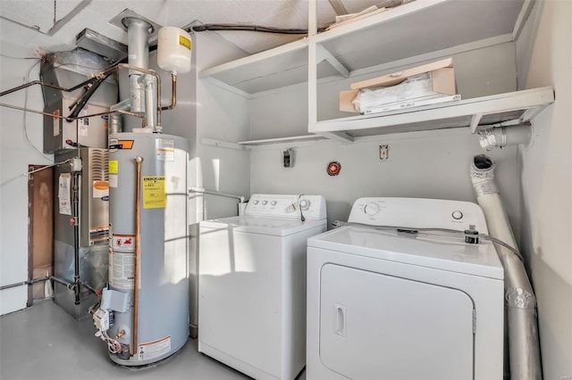 washroom featuring washer and dryer and gas water heater