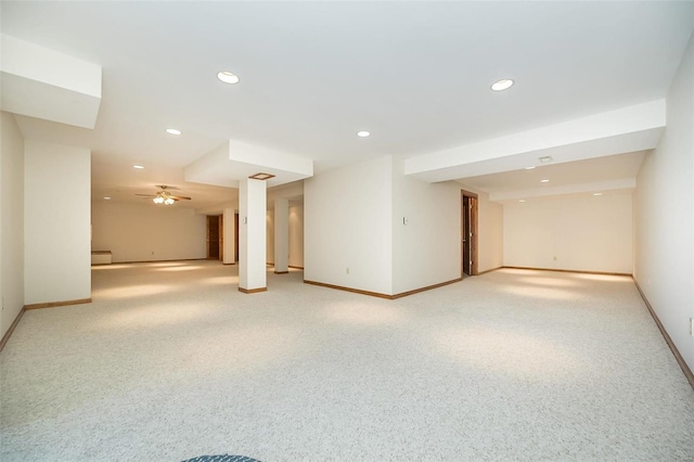 basement featuring light carpet