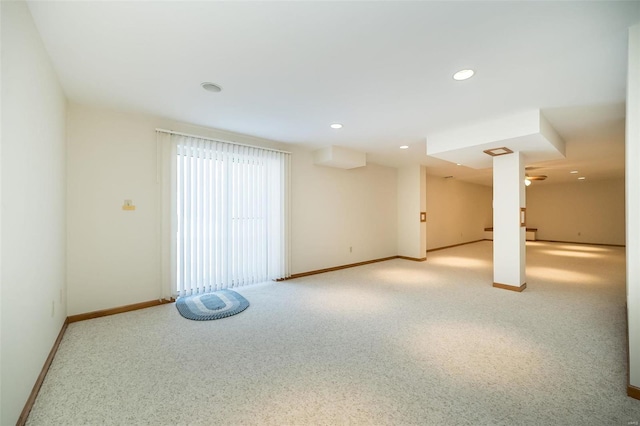 unfurnished room with light carpet