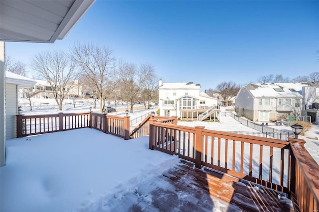 view of snow covered deck