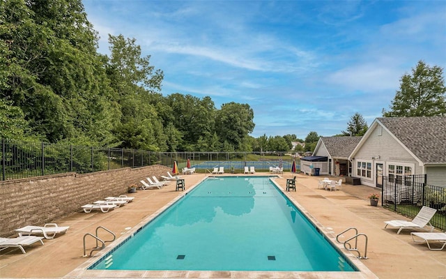 view of pool featuring a patio area