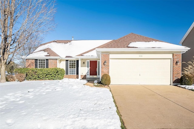 ranch-style home with a garage