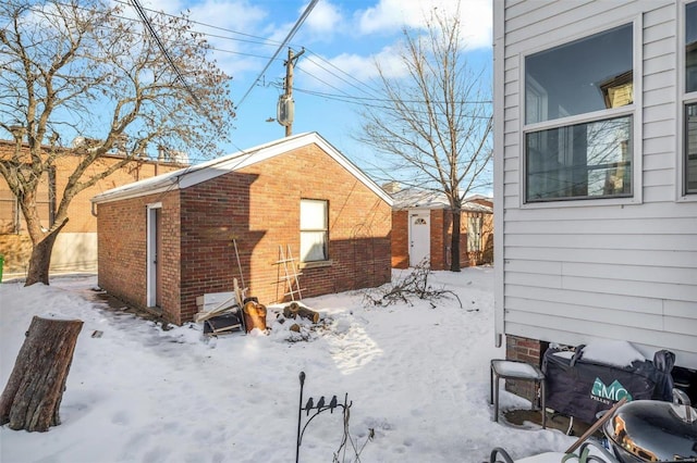 view of snow covered house