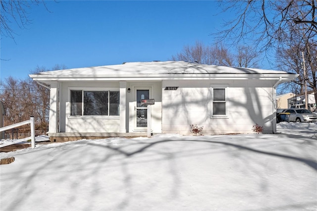 view of snow covered property