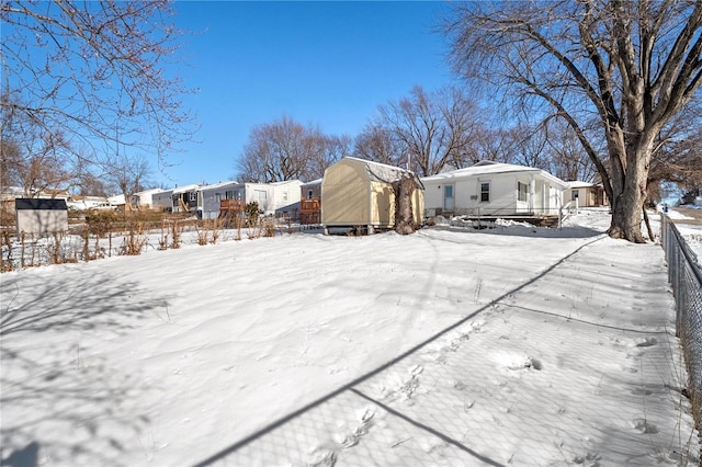 view of yard covered in snow