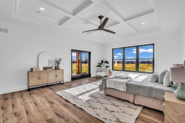 bedroom featuring beamed ceiling, ceiling fan, light hardwood / wood-style flooring, and coffered ceiling