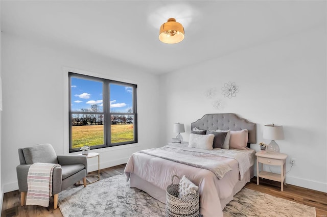 bedroom featuring hardwood / wood-style flooring