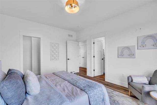 bedroom featuring hardwood / wood-style flooring