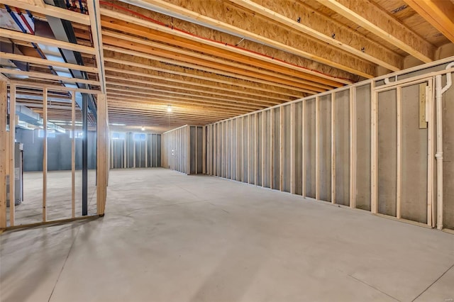 basement featuring water heater